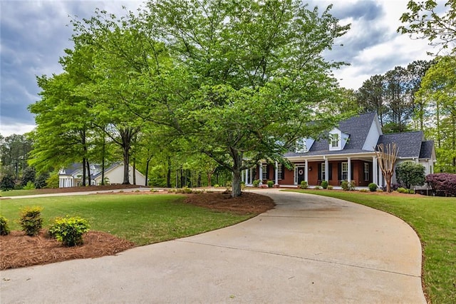 20 Jasmine Ct, Newnan, GA 30265 - view of community with a lawn and curved driveway