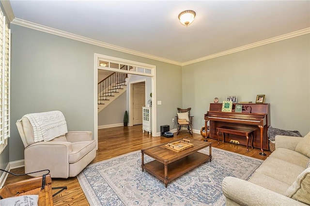 20 Jasmine Ct, Newnan, GA 30265 - living room featuring crown molding, stairway, and wood finished floors