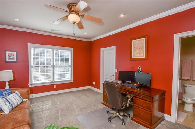 office area featuring baseboards, ornamental molding, a ceiling fan, and carpet flooring