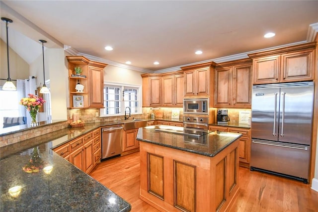 kitchen with built in appliances, a sink, light wood-style floors, brown cabinets, and open shelves