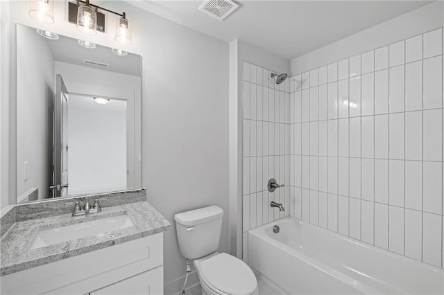bathroom with toilet, shower / bathtub combination, and vanity