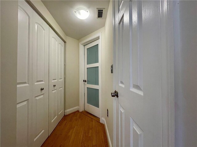 199 14th St NE Unit 710, Atlanta, GA 30309 - hall with wood finished floors and baseboards