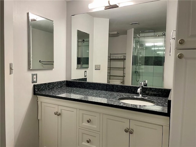 199 14th St NE Unit 710, Atlanta, GA 30309 - full bathroom featuring a stall shower and vanity