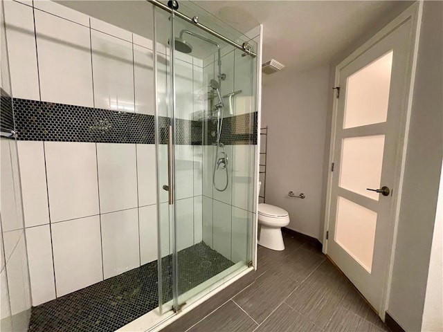 199 14th St NE Unit 710, Atlanta, GA 30309 - bathroom featuring a stall shower and tile patterned floors