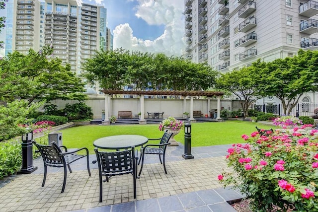 199 14th St NE Unit 710, Atlanta, GA 30309 - view of patio featuring a pergola