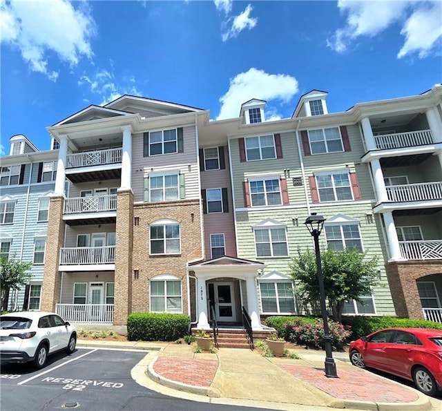 1975 Nocturne Dr Unit 2206, Alpharetta, GA 30009 - view of apartment building / complex with uncovered parking