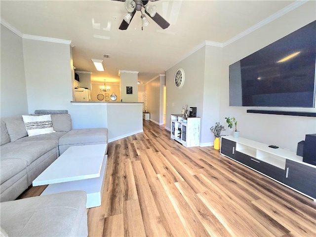 1975 Nocturne Dr Unit 2206, Alpharetta, GA 30009 - living room with a ceiling fan, light wood-type flooring, crown molding, and a chandelier