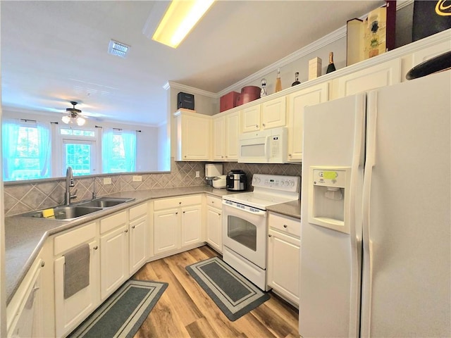 1975 Nocturne Dr Unit 2206, Alpharetta, GA 30009 - kitchen with white appliances, light wood-style floors, ornamental molding, backsplash, and ceiling fan