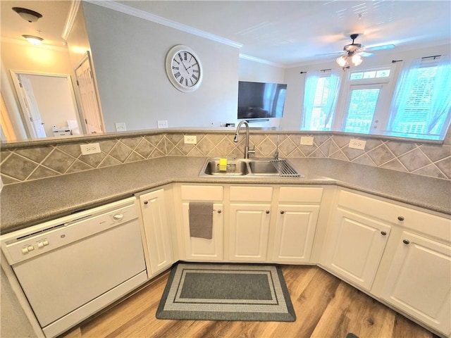 1975 Nocturne Dr Unit 2206, Alpharetta, GA 30009 - kitchen featuring white dishwasher, crown molding, wood finished floors, ceiling fan, and backsplash