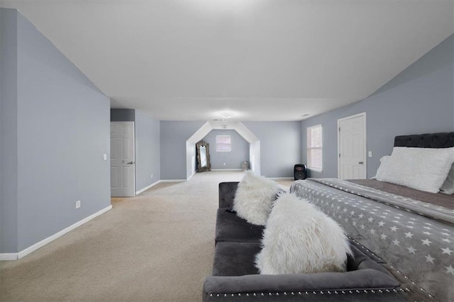 carpeted bedroom with baseboards