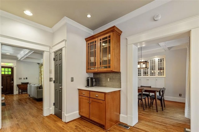 891 Paoli Ave SE, Atlanta, GA 30316 - bar with light wood-style floors, beamed ceiling, decorative backsplash, recessed lighting, and baseboards
