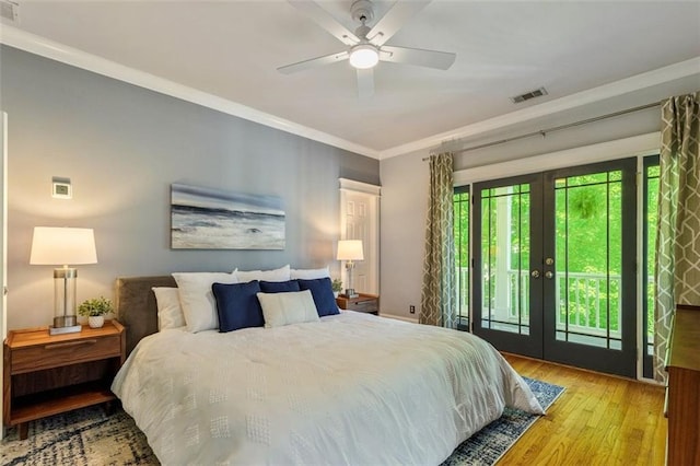 891 Paoli Ave SE, Atlanta, GA 30316 - bedroom with access to outside, french doors, wood finished floors, crown molding, and ceiling fan