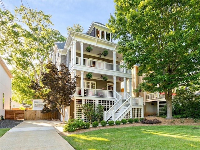 891 Paoli Ave SE, Atlanta, GA 30316 - view of front of house with stairway, covered porch, a ceiling fan, driveway, and a gate