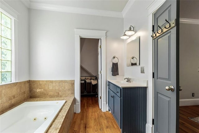 891 Paoli Ave SE, Atlanta, GA 30316 - bathroom with vanity, a whirlpool tub, wood finished floors, and crown molding
