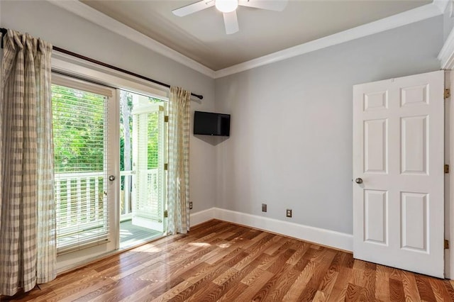 891 Paoli Ave SE, Atlanta, GA 30316 - spare room featuring a ceiling fan, ornamental molding, wood finished floors, and baseboards