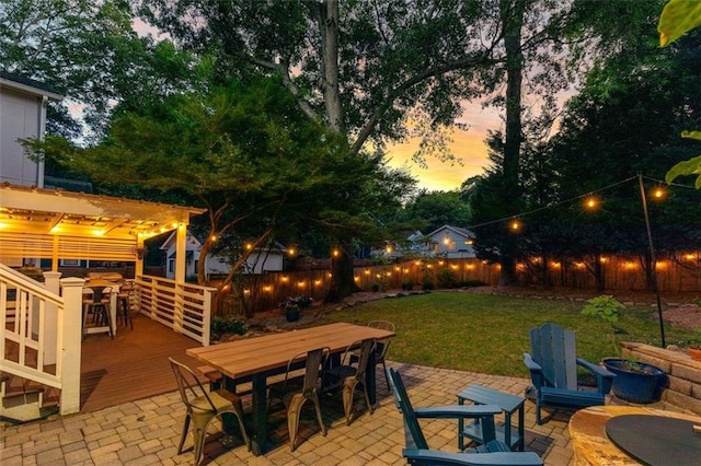 891 Paoli Ave SE, Atlanta, GA 30316 - patio terrace at dusk featuring outdoor dining area and a patio