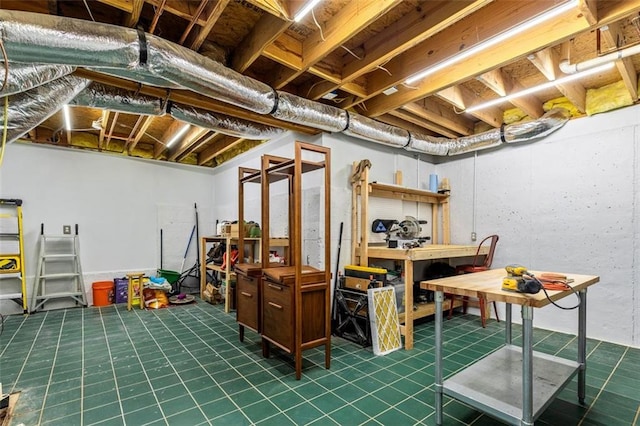891 Paoli Ave SE, Atlanta, GA 30316 - unfinished basement with a workshop area
