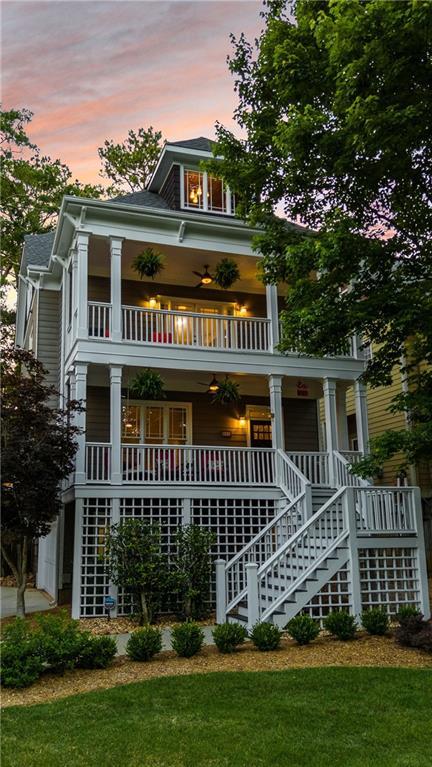 891 Paoli Ave SE, Atlanta, GA 30316 - view of front of property featuring stairway, a balcony, a porch, and a yard