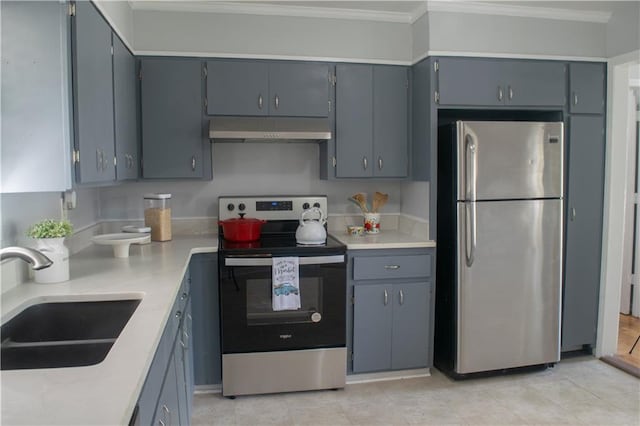 kitchen featuring appliances with stainless steel finishes, crown molding, sink, and gray cabinetry