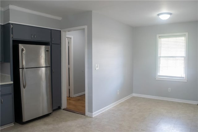 kitchen featuring stainless steel fridge