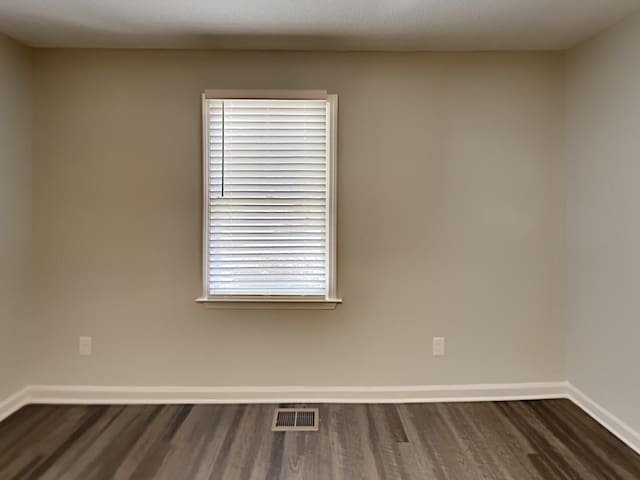 365 Wesley Mill Pl, Villa Rica, GA 30180 - unfurnished room with dark wood-style floors and baseboards