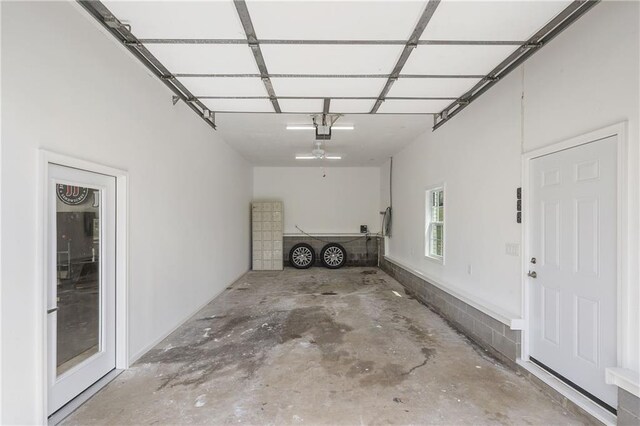 garage featuring a garage door opener