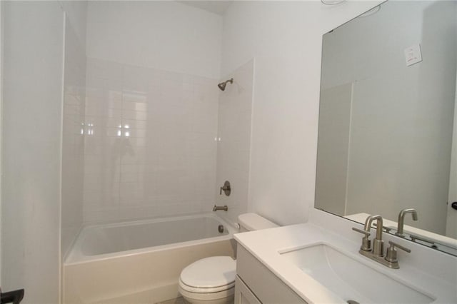 bathroom with shower / bath combination, vanity, and toilet