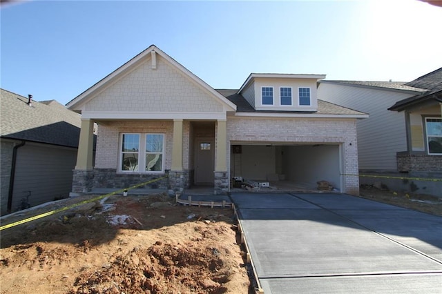 craftsman inspired home with a garage