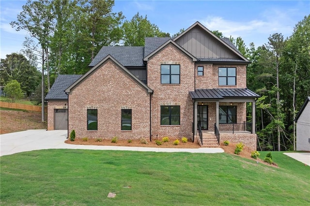 6120 Hutchins Dr, Buford, GA 30518 - craftsman inspired home with covered porch, brick siding, concrete driveway, and a front yard