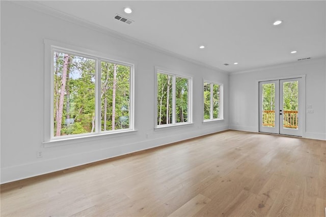 6120 Hutchins Dr, Buford, GA 30518 - spare room with crown molding, french doors, light wood-style floors, baseboards, and recessed lighting