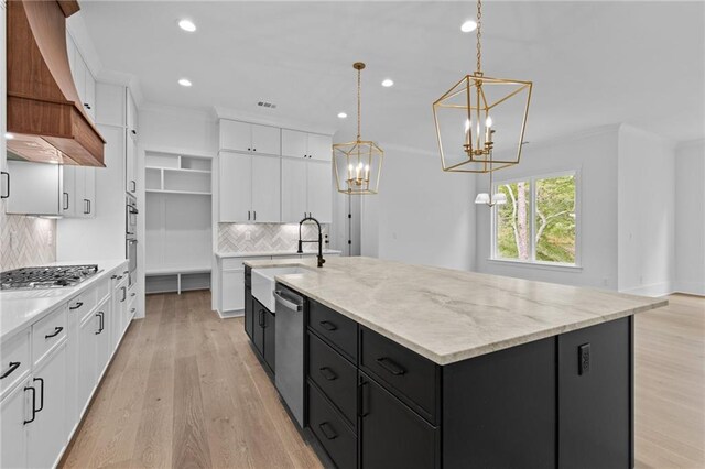 6120 Hutchins Dr, Buford, GA 30518 - kitchen with dark cabinetry, a sink, appliances with stainless steel finishes, white cabinetry, and recessed lighting