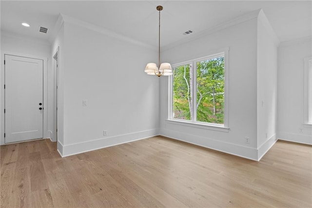 6120 Hutchins Dr, Buford, GA 30518 - unfurnished dining area featuring crown molding, baseboards, light wood-style floors, a chandelier, and recessed lighting