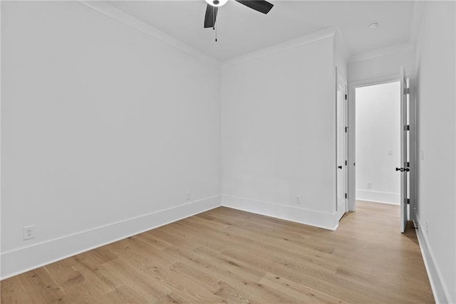 6120 Hutchins Dr, Buford, GA 30518 - unfurnished room featuring ornamental molding, light wood-style floors, baseboards, and a ceiling fan