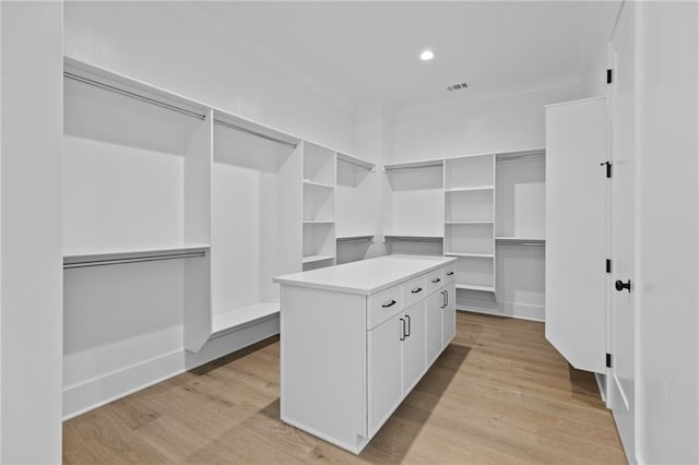 6120 Hutchins Dr, Buford, GA 30518 - walk in closet featuring light wood finished floors