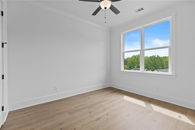6120 Hutchins Dr, Buford, GA 30518 - empty room featuring baseboards, light wood finished floors, ceiling fan, and ornamental molding