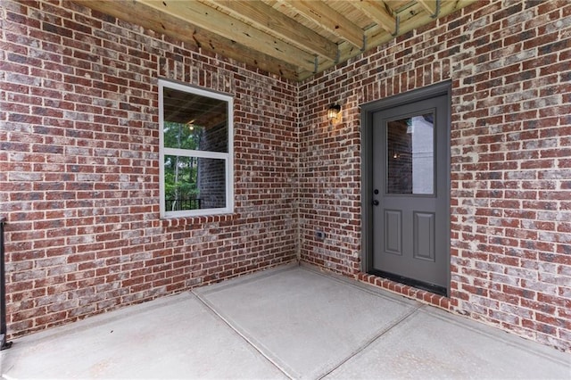 6120 Hutchins Dr, Buford, GA 30518 - doorway to property with brick siding