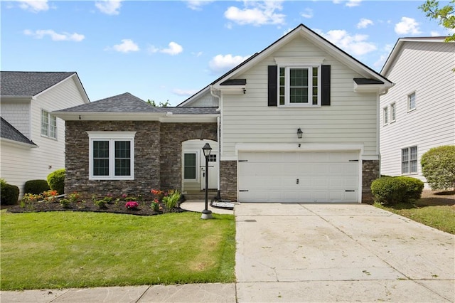 6329 Edgewater Cv, Fairburn, GA 30213 - view of front facade with driveway, stone siding, a garage, and a front lawn