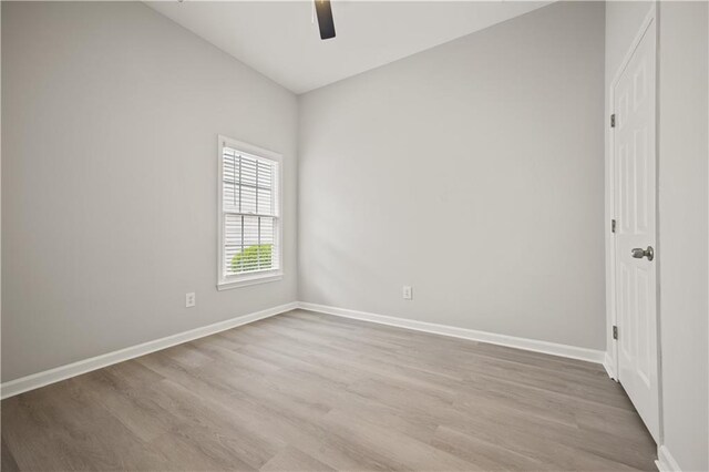 6329 Edgewater Cv, Fairburn, GA 30213 - spare room featuring ceiling fan, wood finished floors, and baseboards