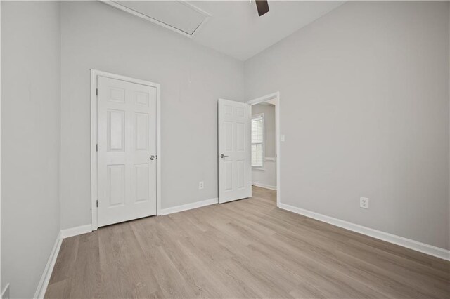 6329 Edgewater Cv, Fairburn, GA 30213 - unfurnished bedroom with baseboards, ceiling fan, and wood finished floors