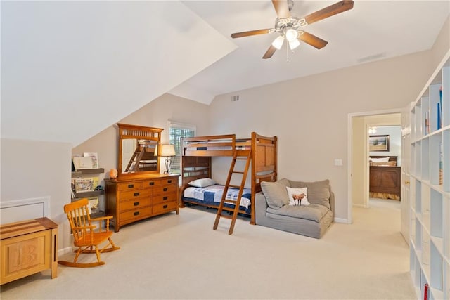 carpeted bedroom featuring baseboards, ceiling fan, and visible vents