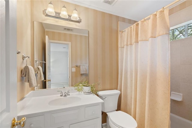 bathroom featuring vanity, wallpapered walls, toilet, and visible vents