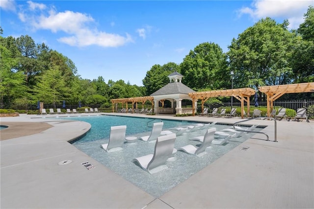 community pool with a gazebo, fence, a pergola, and a patio