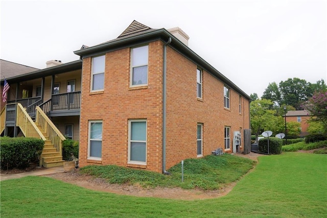 view of home's exterior featuring a yard