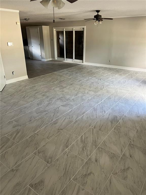 empty room with ceiling fan