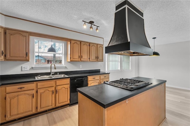 kitchen featuring sink, stainless steel gas cooktop, black dishwasher, light hardwood / wood-style flooring, and custom exhaust hood