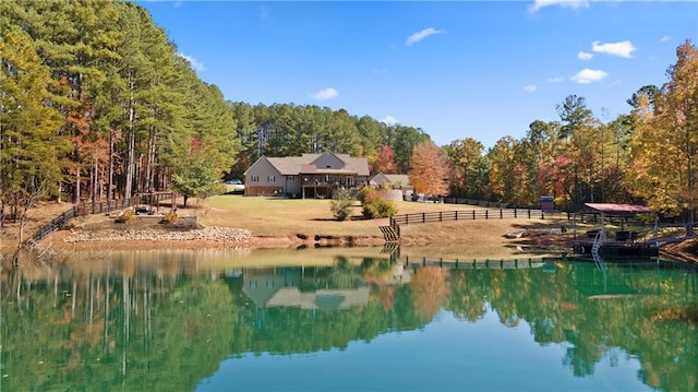 water view featuring a wooded view