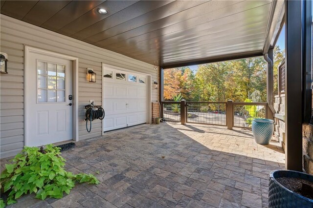 exterior space with decorative driveway