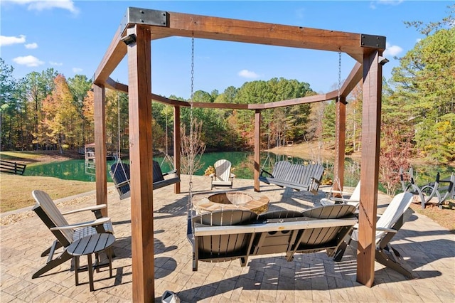 view of patio / terrace with an outdoor fire pit