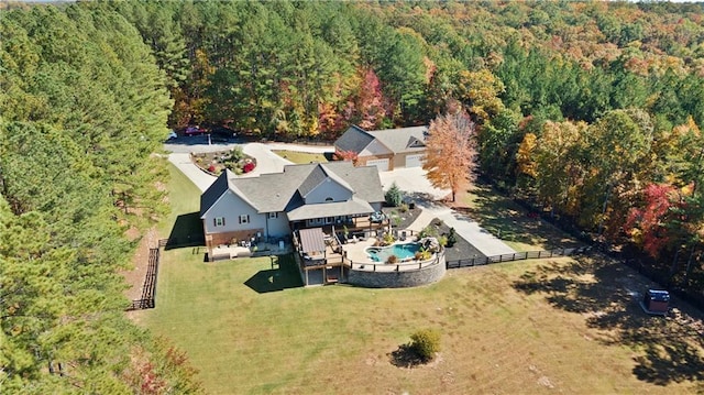 bird's eye view featuring a forest view