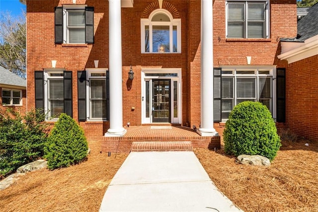 1105 River Laurel Dr, Suwanee, GA 30024 - view of exterior entry featuring brick siding
